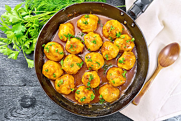 Image showing Meatballs in pan on board top