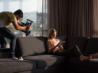 Image showing Woman Using Tablet On Couch At Home