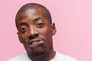 Image showing Positive thinking African-American man on pink background