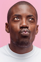 Image showing Positive thinking African-American man on pink background