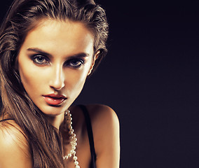 Image showing beauty young  woman with jewellery close up, luxury portrait of rich real girl, party makeup