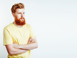 Image showing young handsome hipster ginger bearded guy looking brutal isolated on white background, lifestyle people concept 