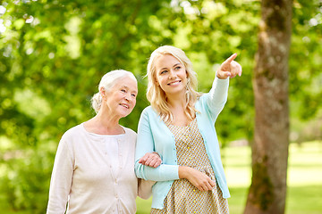 Image showing daughter with senior mother at park