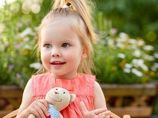 Image showing portrait of happy beautiful little girl outdoors