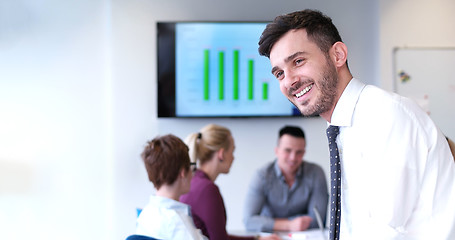 Image showing Businessman using tablet in modern office