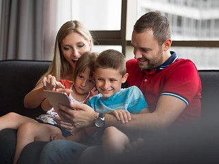 Image showing young cuple spending time with kids