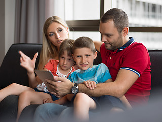 Image showing young cuple spending time with kids