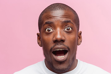 Image showing The portrait of handsome young surprised black african man