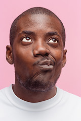 Image showing Positive thinking African-American man on pink background