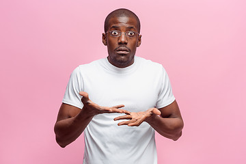 Image showing The portrait of handsome young surprised black african man