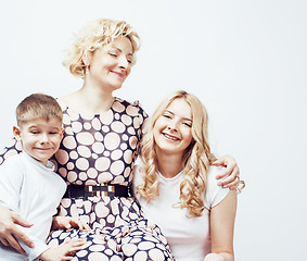 Image showing happy smiling family together posing cheerful on white background, lifestyle people concept, mother with son and teenage daughter isolated 