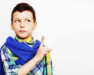 Image showing young pretty little cute boy kid wondering, posing emotional face isolated on white background, gesture happy smiling close up, lifestyle real people concept