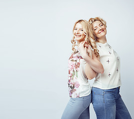 Image showing mother with daughter together posing happy smiling isolated on white background with copyspace, lifestyle people concept 