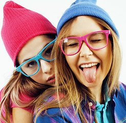 Image showing best friends teenage girls together having fun, posing emotional on white background, besties happy smiling, lifestyle people concept