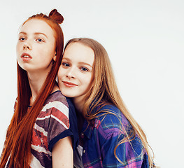 Image showing best friends teenage girls together having fun, posing emotional on white background, besties happy smiling, lifestyle people concept