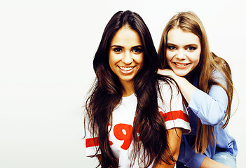 Image showing best friends teenage girls together having fun, posing emotional on white background, besties happy smiling, lifestyle people concept