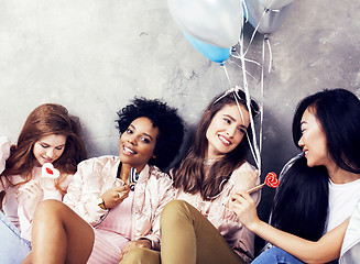 Image showing Lifestyle and people concept: young pretty diversity nations woman with different age children celebrating on birth day party together happy smiling, making selfie. African-american, asian and caucasi