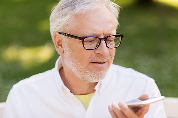 Image showing old man using voice command recorder on smartphone