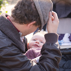 Image showing Father with cheerful child in the park.