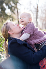 Image showing Father with cheerful child in the park.