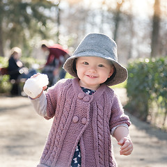 Image showing The first steps of the kid in the big world.