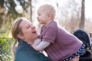 Image showing Father with cheerful child in the park.