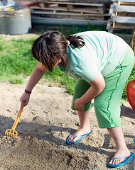 Image showing Girl Playing In Sand