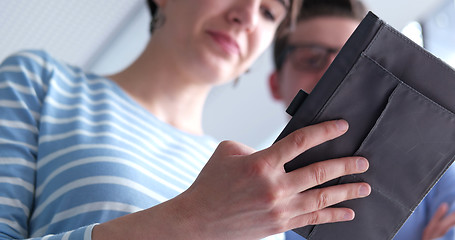 Image showing low angle shot of business people using technology