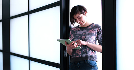 Image showing Business Woman Using Digital Tablet in front of Office