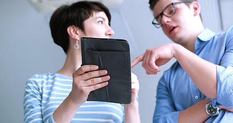 Image showing low angle shot of business people using technology