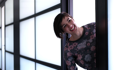 Image showing Business woman having fun in office building