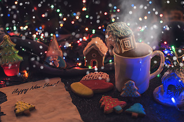 Image showing Christmas cookies and cup of tea