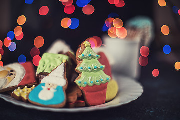 Image showing Christmas cookies and cup of tea