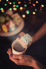 Image showing Christmas cookies and cup of tea