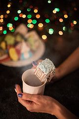 Image showing Christmas cookies and cup of tea