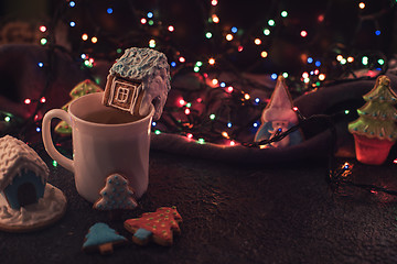 Image showing Christmas cookies and cup of tea