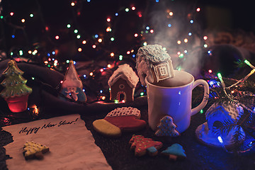 Image showing Christmas cookies and cup of tea