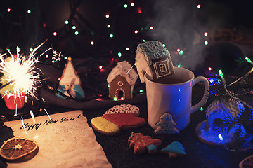 Image showing Christmas cookies and cup of tea