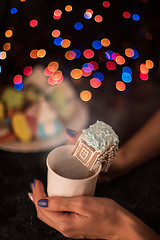 Image showing Christmas cookies and cup of tea