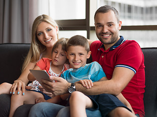 Image showing young cuple spending time with kids