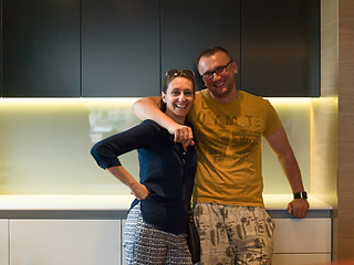 Image showing Young couple in the kitchen