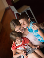 Image showing Young Family Using A Tablet To Make Future Plans