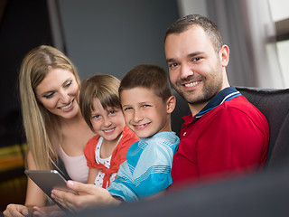 Image showing young cuple spending time with kids