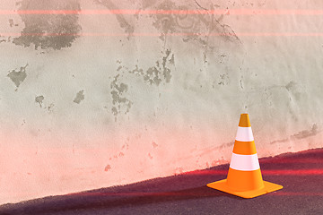 Image showing a traffic cone on a wall