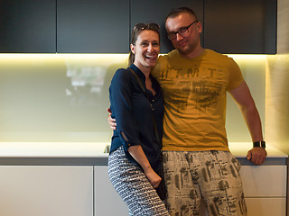 Image showing Young couple in the kitchen