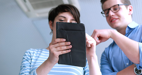 Image showing low angle shot of business people using technology