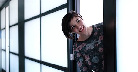 Image showing Business woman having fun in office building