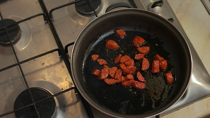 Image showing Cooking with sausages