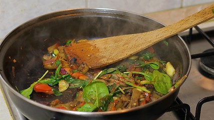 Image showing Preparing hot breakfast