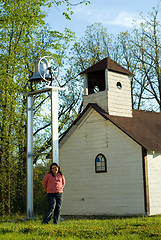 Image showing Girl In Front of Schoolhouse